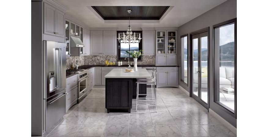 Merillat  Reflecting the ongoing love affair with neutrals, the manufacturer’s new paint color Shale is a soft, warm gray available in 19 door styles, including LaBelle (on the perimeter cabinets) and Bellingham (on the island).