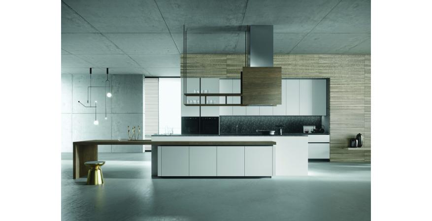 Snaidero USA  Look by Michele Maron takes on warmth by pairing sleek, minimalist cabinets in laminate or lacquer with a wooden worktop. Available in a variety of lengths and widths, the worktop installs over base units or as a freestanding work surface