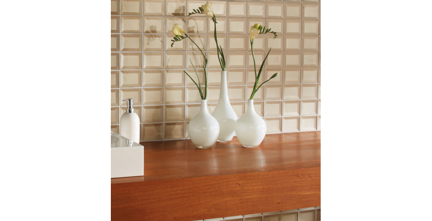 Marazzi  Luminescence is a highly reflective poured glass tile that appears to have depth but is completely flat. Available in eight colors, the mesh-mounted sheet measures 9 by 12 inches.