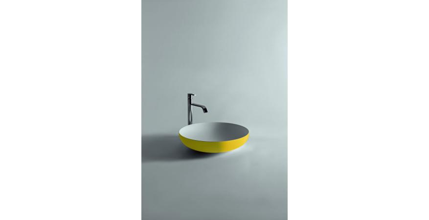 Flumood, a new collection of top-mount solid surfacing sink in yellow