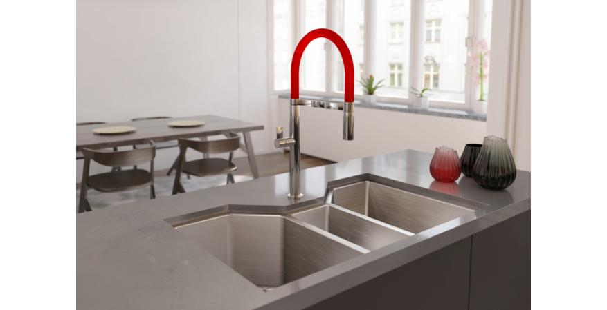 Made from stainless steel, the Ibiza faucet measures 20 inches tall with a spout reach of 9 inches. The flexible spout also pulls down to access the far corners of the sink. In ruby red.