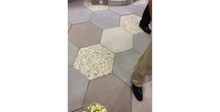 These modular pavers take the look of a variety of materials, but they are made from precast concrete. Each paver has subtle radius edges and finely blasted surface details.