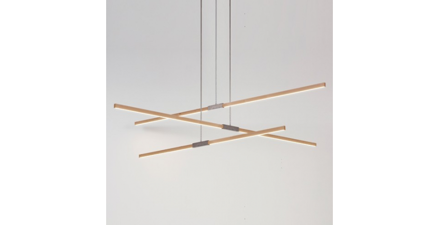The Multiple Pendant pairs three linear pendants, each consisting of a central piece of hardware joining two Stickbulbs, in a shared canopy. The lights can be configured for uplighting or downlighting.