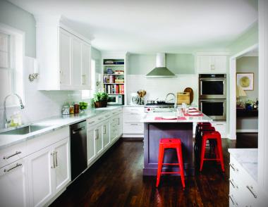 Presented with a dark, 157-square-foot kitchen, designer Nadia Subaran eliminated doors and added creative storage to give the space a new lease on life.