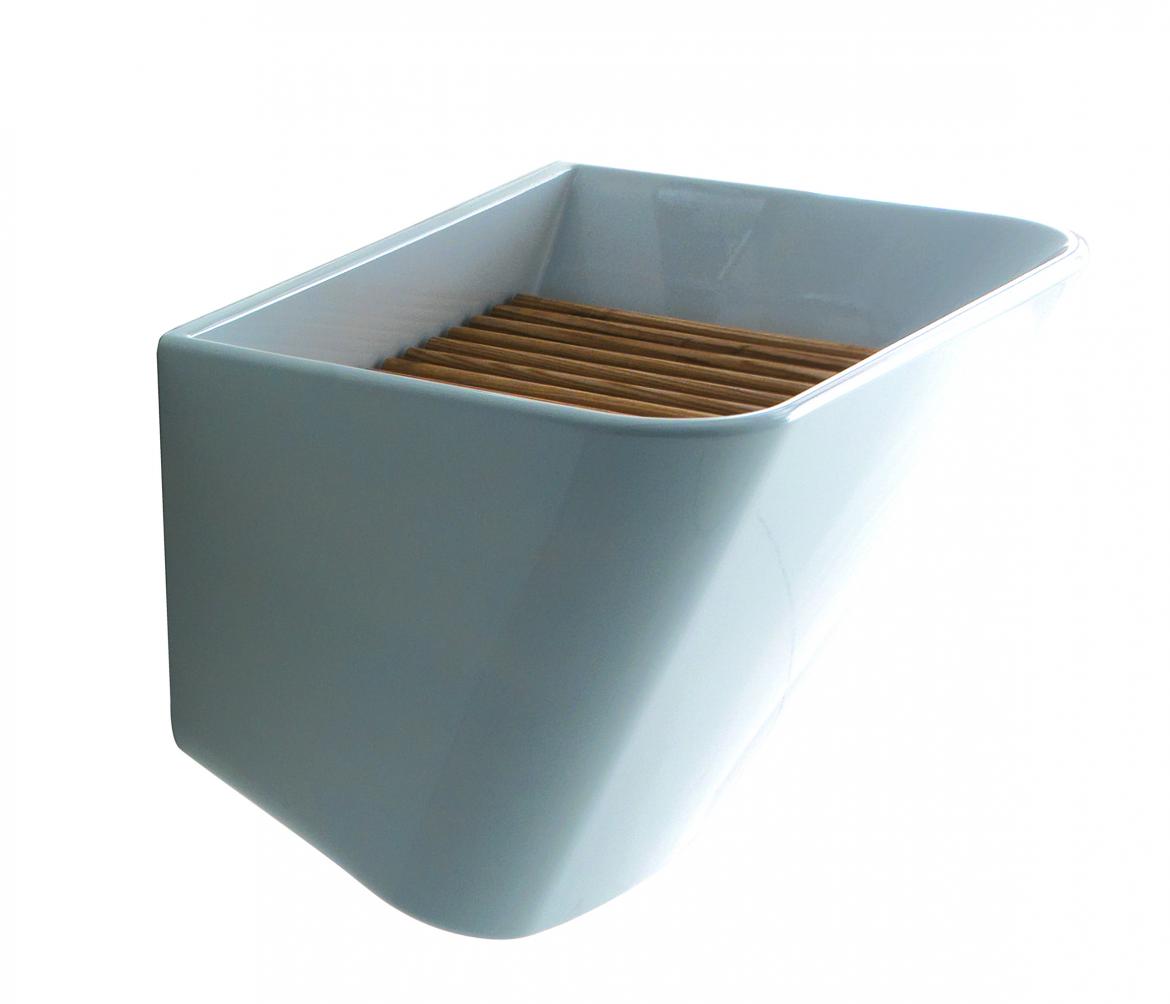 Meg11 is a modern take on the utility sink. Designed by Antonio Pascale, the wall-mounted washbasin is made from a single block of ceramic and features clean, fluid lines. It measures 25½ inches wide and comes with an ash wood grate.