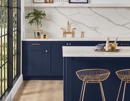 Sherwin Williams Color Survey blue kitchen cabinets brass faucets chairs