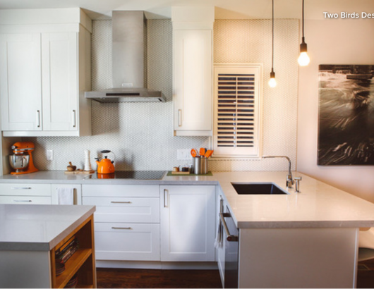 Without expanding the square footage, a designer added cabinet and counter space and managed to double the storage capacity in a kitchen of a semi-detached Toronto home.