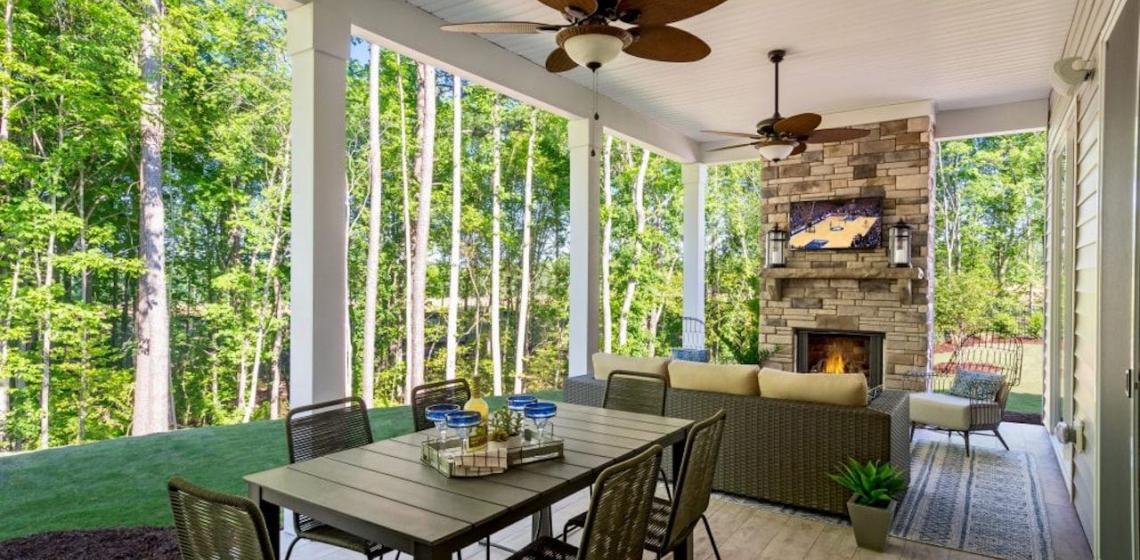Outdoor patio with seating and fan