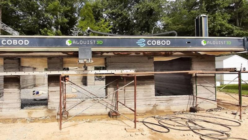 COBOD 3D printer laying house foundation